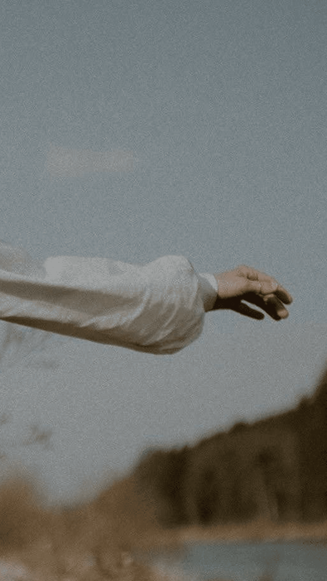 Artistic arm reaching out