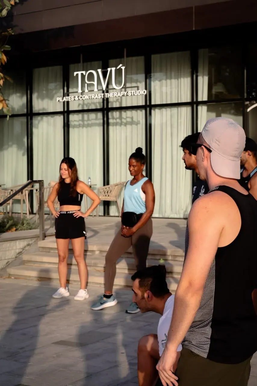 BeyondLeFifth running club gathering outside TAVÚ