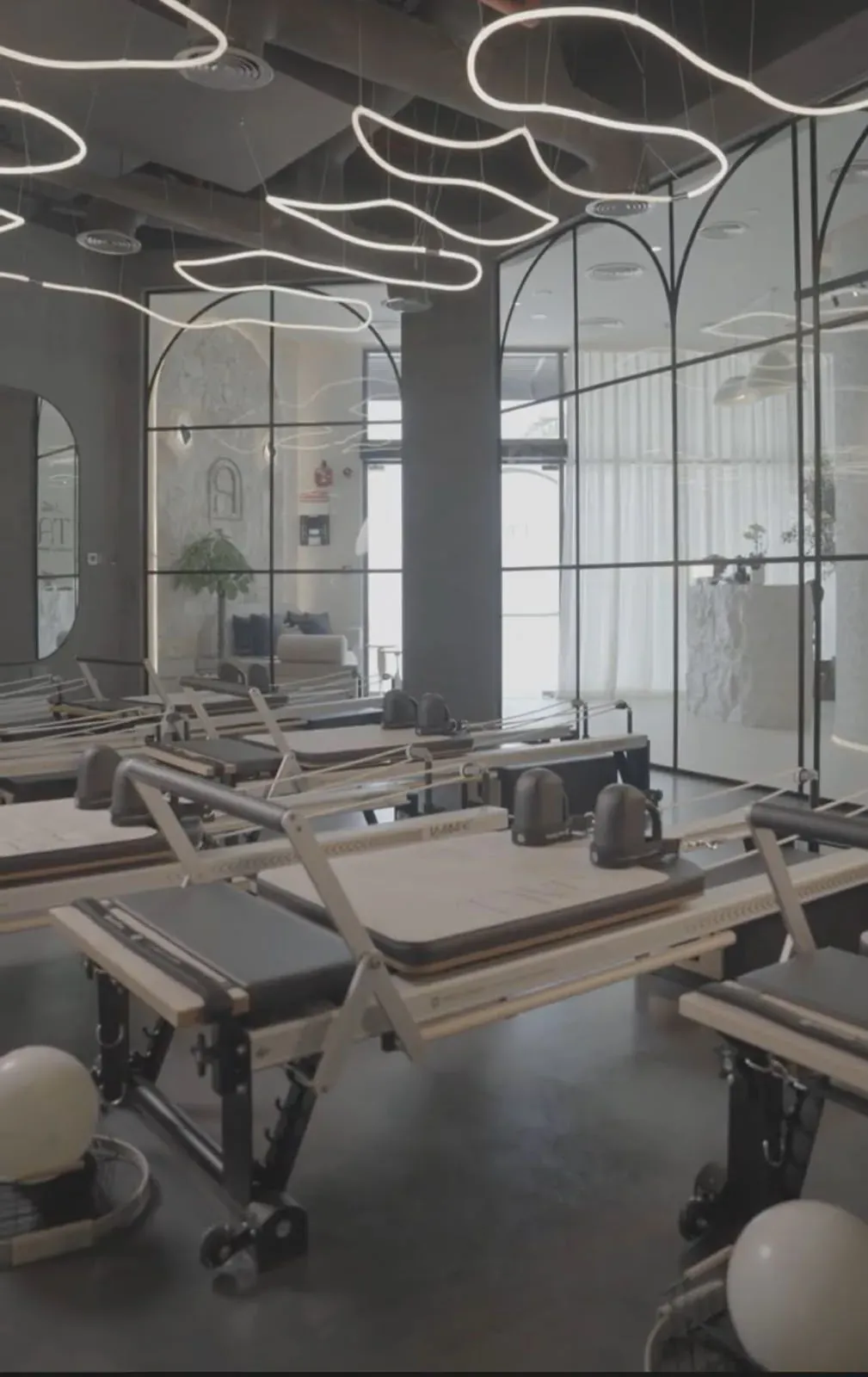 TA — the TAVÚ Reformer studio, grounding the body